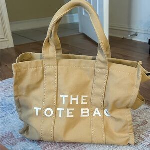 Tan Canvas Tote with White Lettering